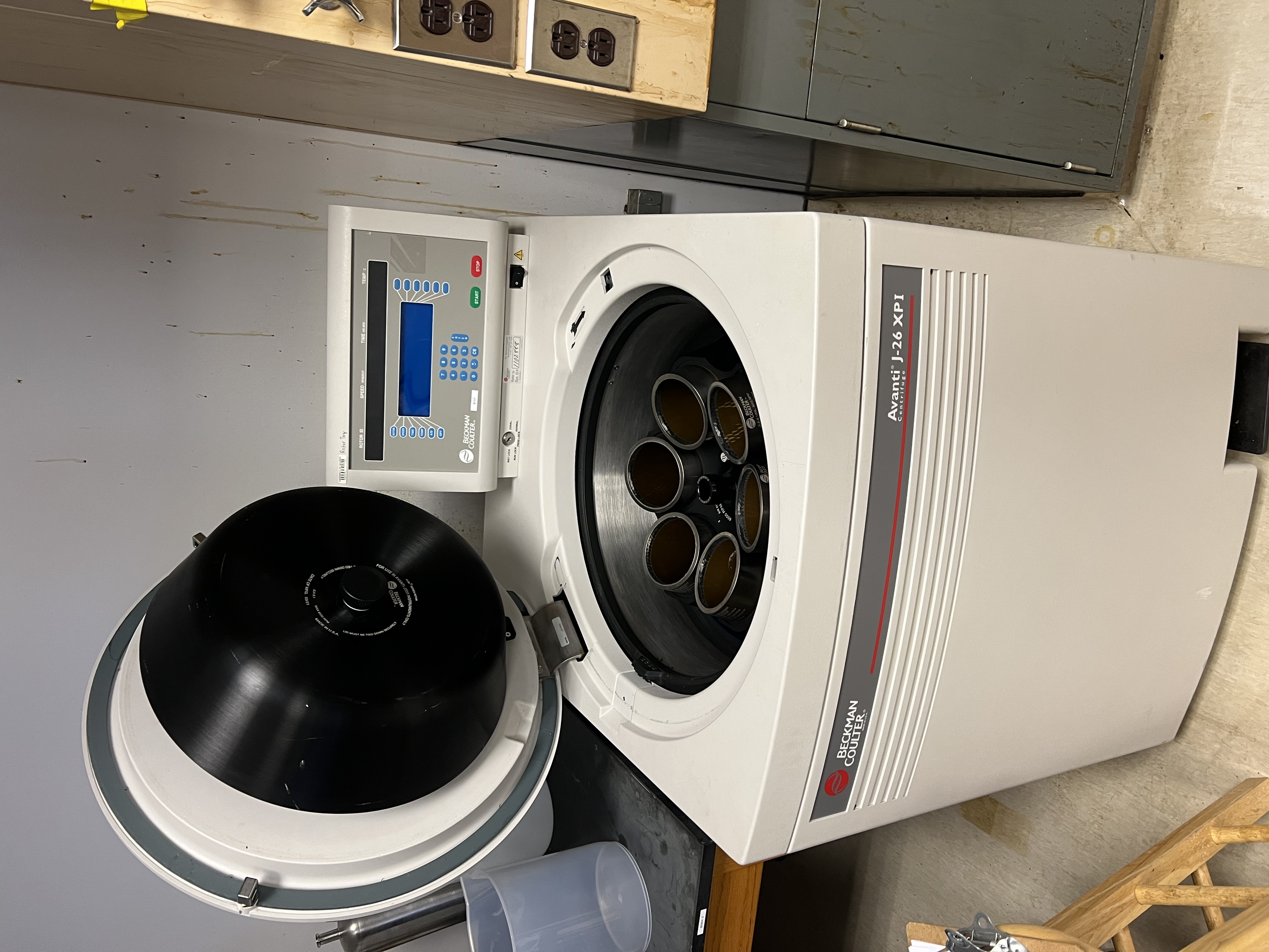 A laboratory centrifuge in a quality-control laboratory, an off-line sample-preparation instrument